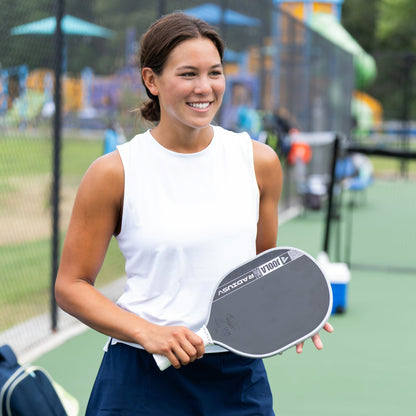 Player on court holding the JOOLA Pro V Radius 16mm Pickleball Paddle