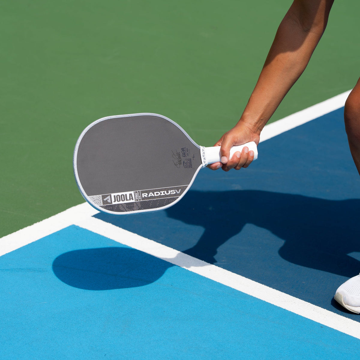 Close-up of the JOOLA Pro V Radius 16mm Pickleball Paddle in play
